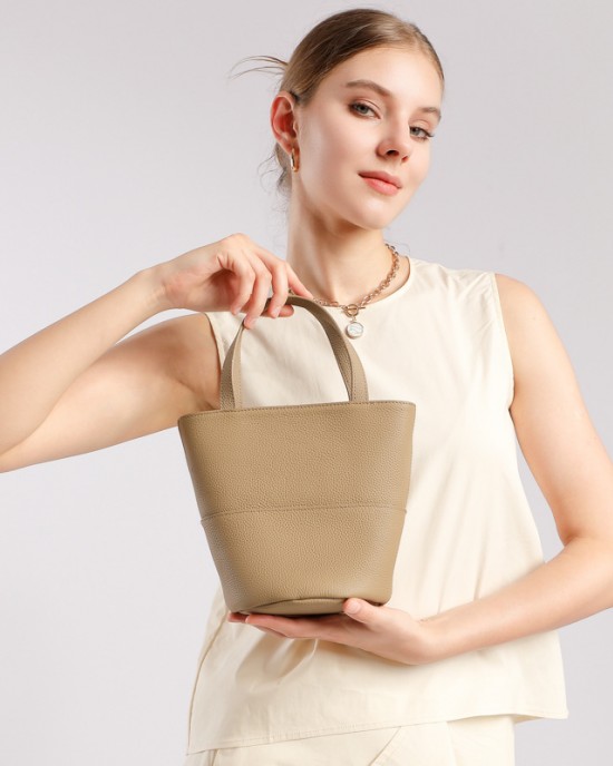 2025 niche new genuine leather basket shoulder and crossbody bag, Korean niche design, fashionable and versatile bucket bag