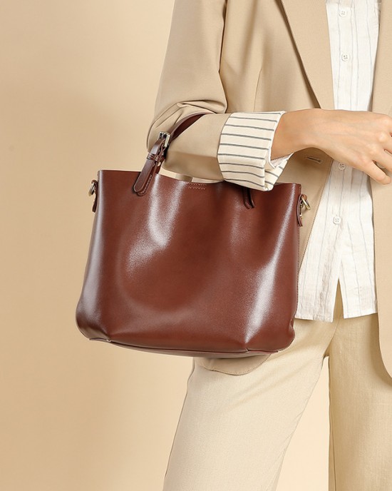 Simple, large-capacity, top-grain cowhide commuter tote bag, versatile, high-end, shoulder-shoulder, crossbody bucket bag for women. Simple, large-capacity, top-grain cowhide commuter tote bag, versatile, high-end, shoulder-shoulder, crossbody bucket bag for women.