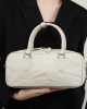 A new, niche Boston bowling bag for women, a stylish, underarm crossbody bag for commuters.
