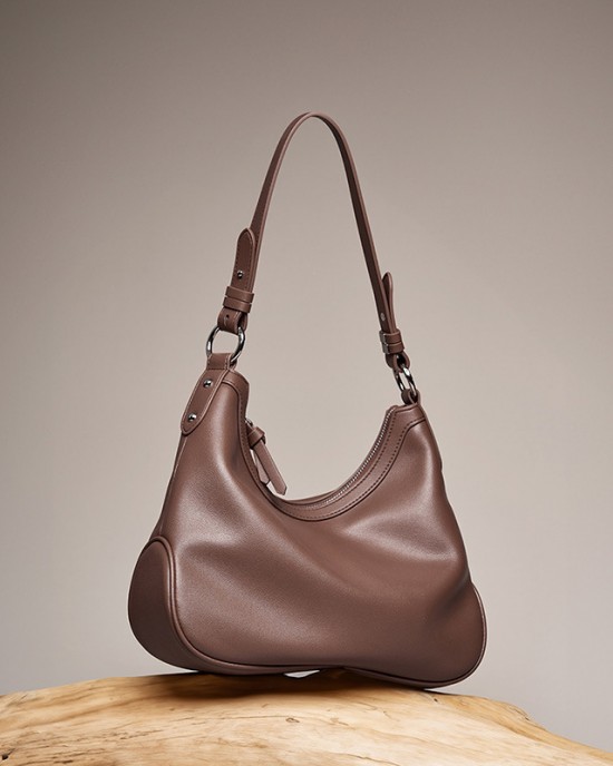 A new, premium, versatile crossbody bag for women, a new, niche Boston bowling bag for women, a stylish, underarm crossbody bag for commuters.